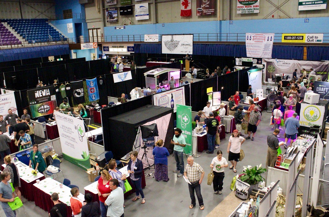 An overhead view of vendor booths and visitors on a past Maine Cannabis Expo floor